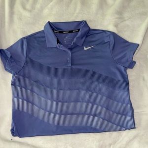 purple nike golf shirt.